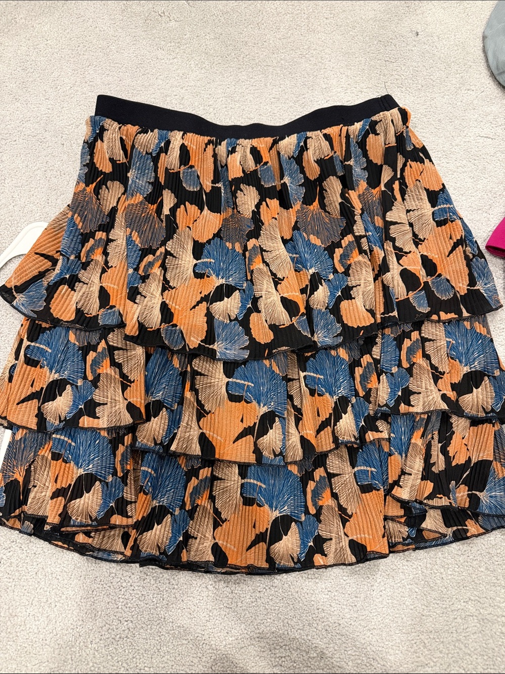 MELLODAY Black Tiered Mini Skirt with Orange, Blue, and Tan Floral Print